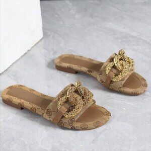 Elegant Brown Slip-On Sandal with Gold Accents